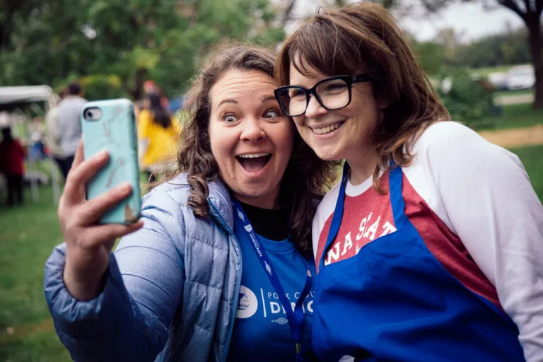 Former White House Deputy Chief of Staff Alyssa Mastromonaco poses for a selfie with a fan