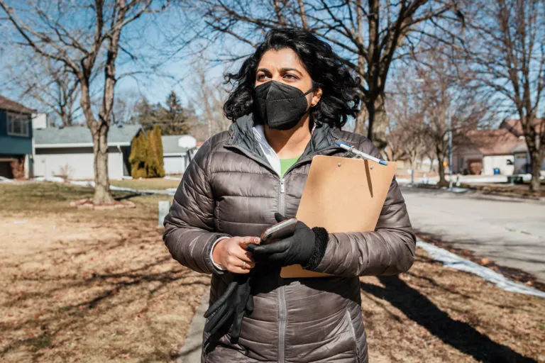 Megan Srinivas walking down a sidewalk