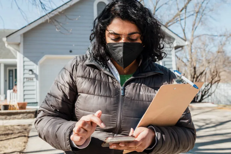 Megan Srinivas recording notes in her canvassing app